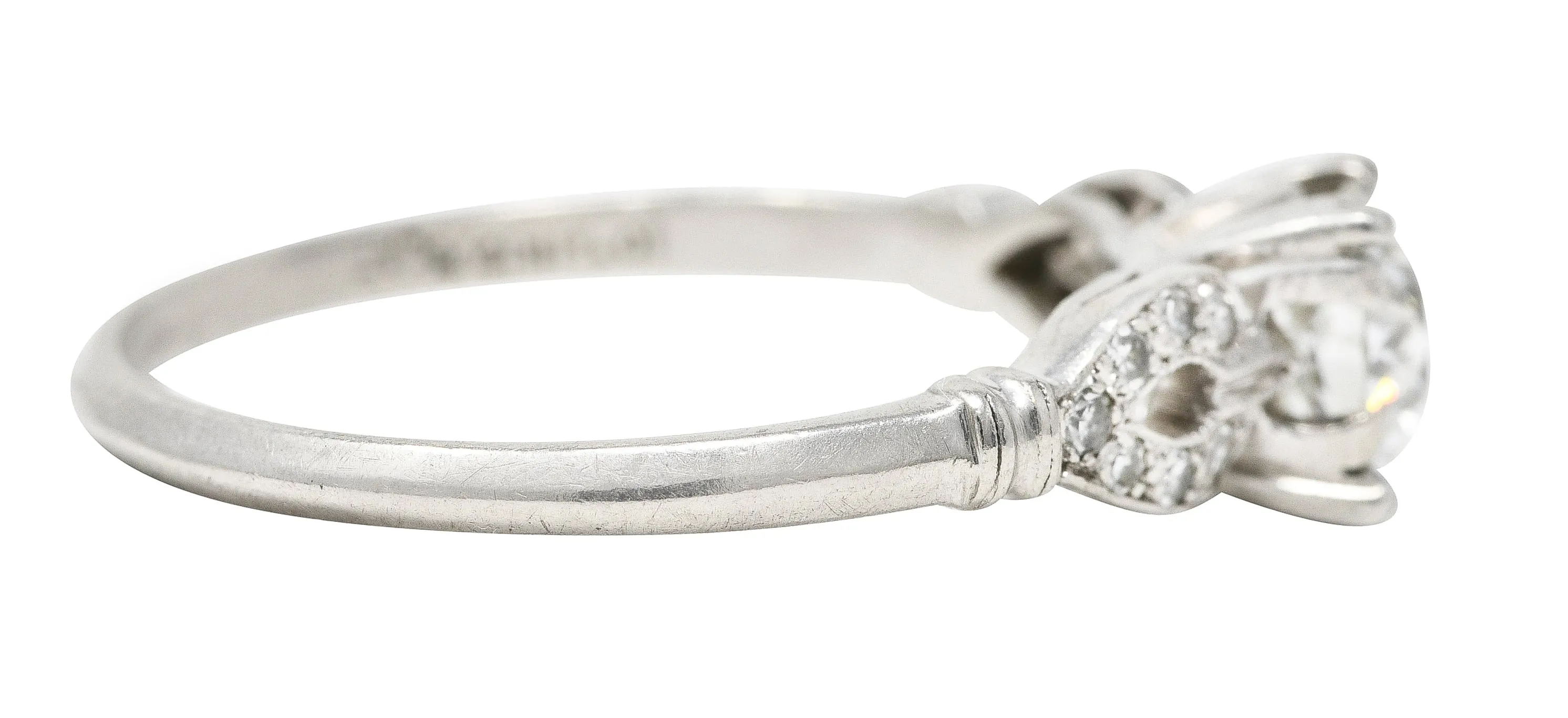 1930's Art Deco 0.90 CTW Diamond Platinum Buckle Engagement Ring