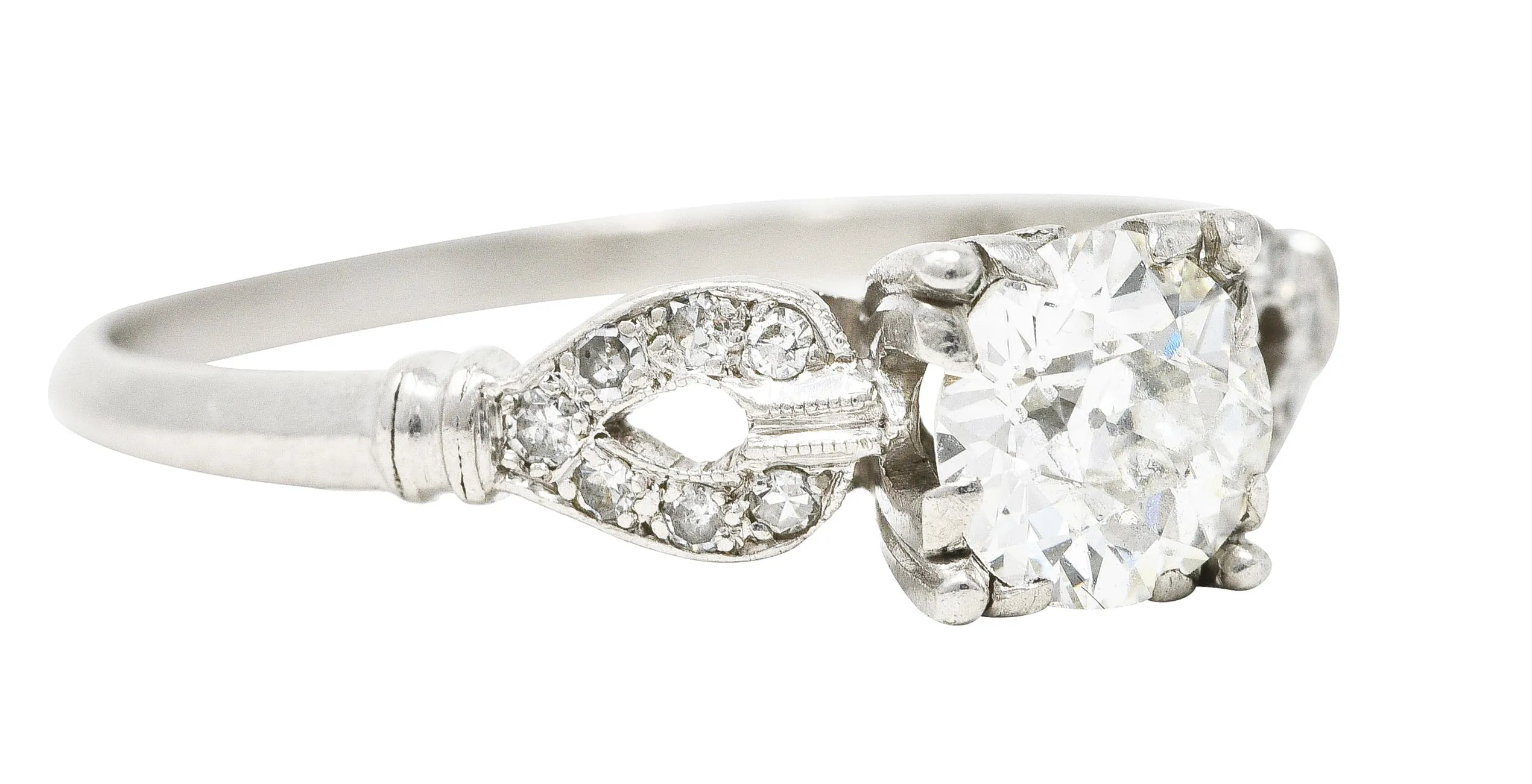 1930's Art Deco 0.90 CTW Diamond Platinum Buckle Engagement Ring