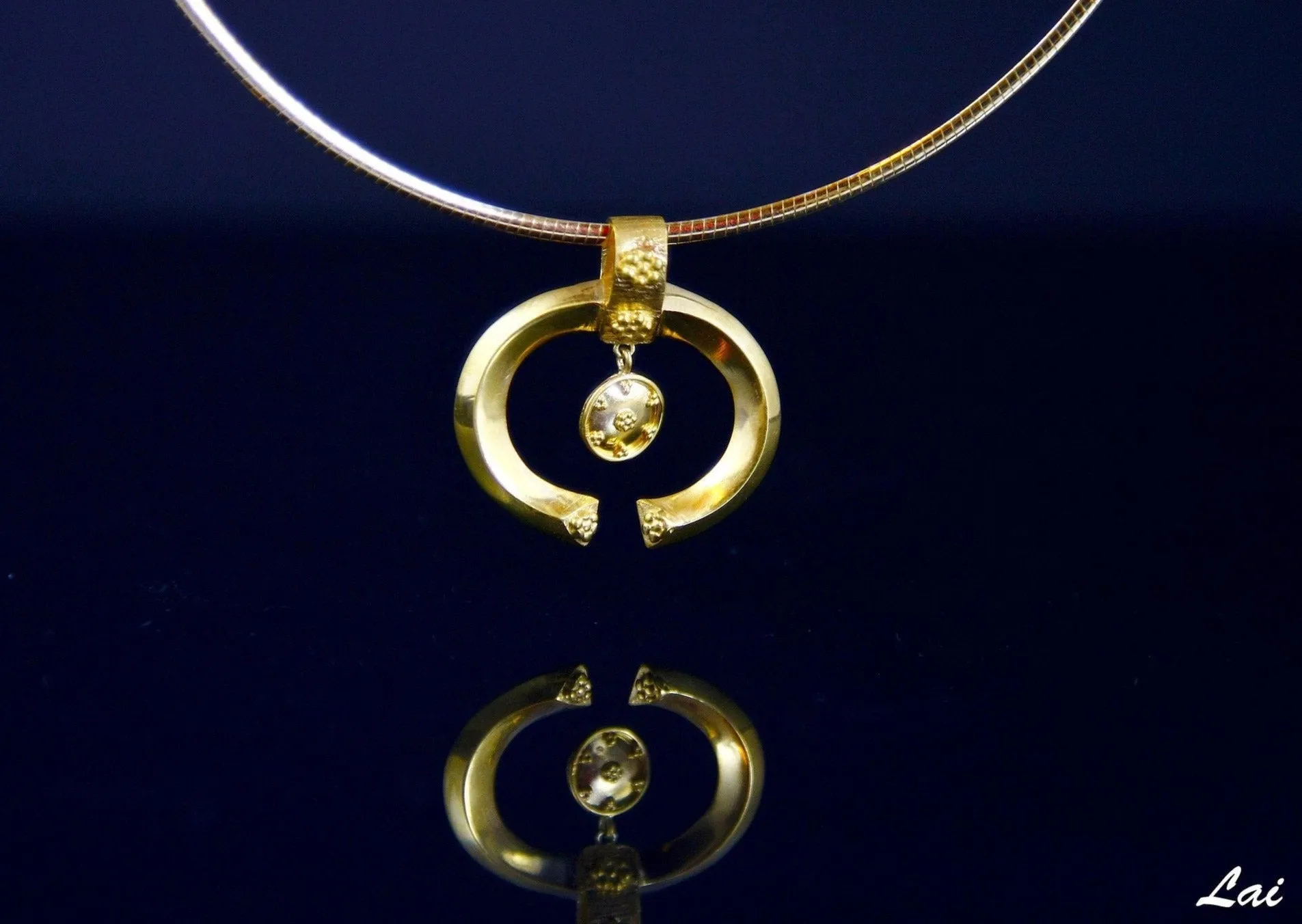Beautiful and unique, Greek-inspired, open oval gold-plated pendant