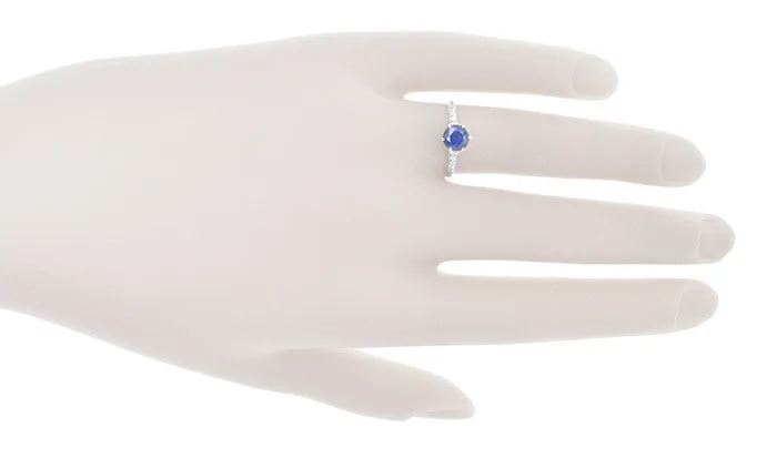 Edwardian High Set Solitaire Blue Sapphire Engagement Ring in Platinum