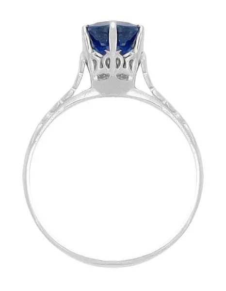 Edwardian High Set Solitaire Blue Sapphire Engagement Ring in Platinum