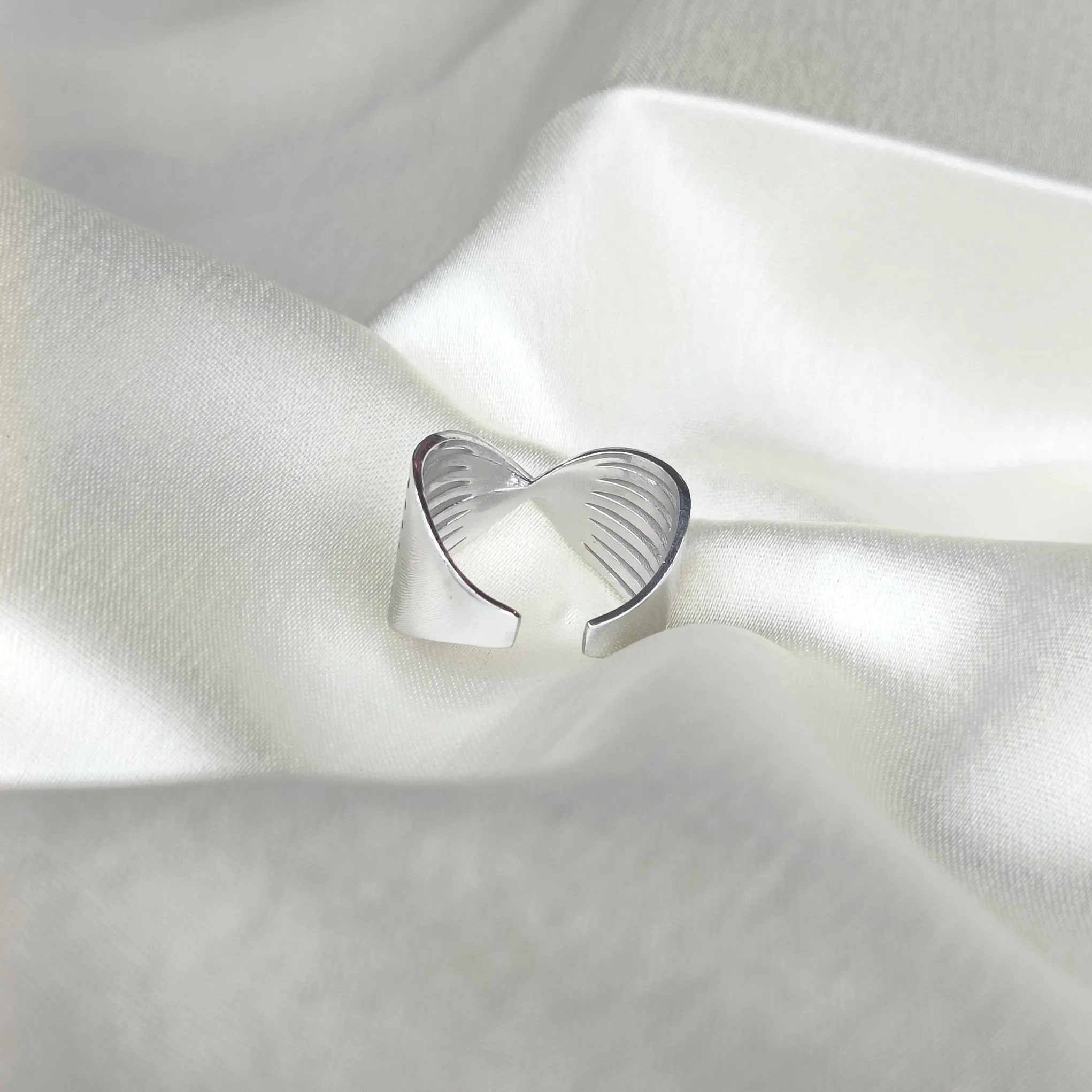 Graceful Ribbon Loop Silver Ring